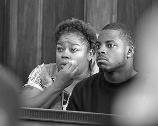        ROBERT K. YOSAY  | THE VINDICATOR..Family members of Darnell Wilkerson listen the sentencing of Darnell