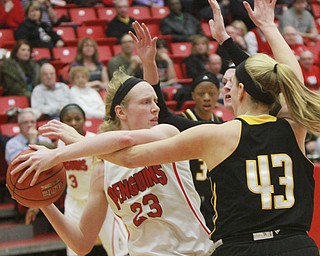 William D Lewis The Vindicator YSU'ssarah Cash (23) keeps the ball from Milwaukee's  Christina Wakeman(43).
