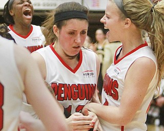 William D Lewis The Vindicator  YSU's Kelsea Newman(13) gets conrats from Melinda Trimmer, right, after sinking a shot at the buzzer to defeat Milwaukee 69-67 Thursday 1-7-16 . At left is Indiya Benjamin.