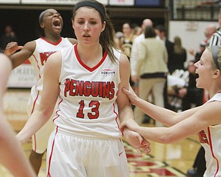 William D Lewis The Vindicator  YSU's Kelsea Newman(13) gets conrats from Melinda Trimmer, right, after sinking a shot at the buzzer to defeat Milwaukee 69-67 Thursday 1-7-16 . At left is Indiya Benjamin.
