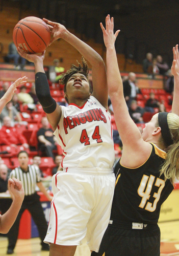 William d Lewis The vindicator YSU's Janae Jackson(44) shoots past Milwaukee's Christina Wakeman(43).