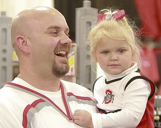 William D Lewis the vindicator  Jason Newman and hsi daughter Joan of Canfield were among the hundreds waiting to see OSU star Ezekiel Elliott during a 1-9-167 event at the Eastwood Mall in Niles.