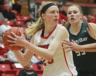 William D Lewis the vindicator YSU's Sarah Cash(23) keeps the ball from Greenbays Sam Terry(55) during 1-9-16 game at YSU.