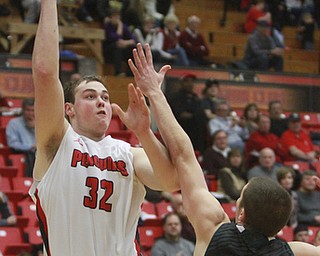 William D Lewis the vindicator YSU's Jordan Kaufman(32) shoots over Green baysTurner Botz(2)during 1-9-16 game at YSU.