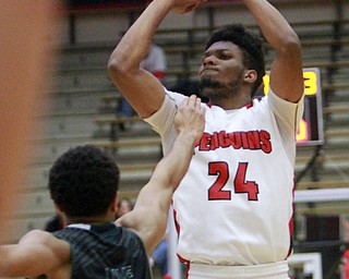 William D Lewis the vindicator YSU's Cameron Morse(24) scores past GB's Carrington Love(12) during 1-9-16 game at YSU.