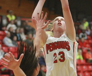 William D Lewis the vindicator YSU's Sarah Cash(23) shoots over Greenbays Mehryn Kraker(10) during 1-9-16 game at YSU.