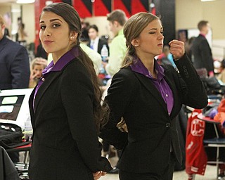 Briana Davis (right) and Marina Merlo (left) of Columbiana High School run through their duo interpretation of one of the Narnia novels in the cafeteria of Canfield High School during a Speech and Debate competition on Saturday morning.  Dustin Livesay  |  The Vindicator  1/9/16  Canfield.