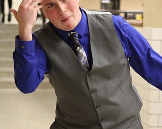 Canfield High School junior, Jack Cross, practices his dramatic skit as a veteran titled "Mass Casualties" in the cafeteria of Canfield High School during a Speech and Debate competition on Saturday morning.  Dustin Livesay  |  The Vindicator  1/9/16  Canfield.