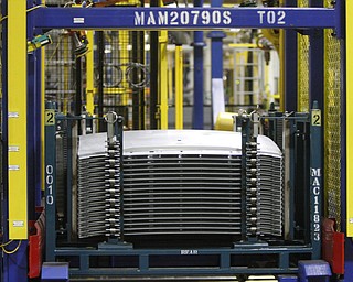       .   ROBERT K. YOSAY  | THE VINDICATOR..Finished parts for the 2016.. sit on automatic movers.....GM Lordstown - as it ramps up to the New Generation Cruise 2016 in February....--30-...