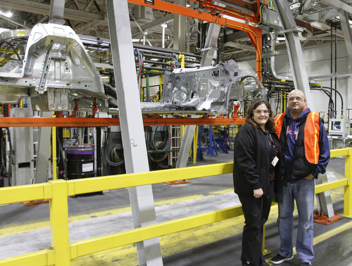       .   ROBERT K. YOSAY  | THE VINDICATOR..one of the new 2016 Cruze Frames  ( unibody ?)  with Michele Lambert  -  and Robert Morales....president of 1714 ..GM Lordstown - as it ramps up to the New Generation Cruise 2016 in February....--30-...