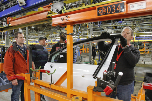       .   ROBERT K. YOSAY  | THE VINDICATOR..Brian Stevens - Patrick Fleischer - Vernon Mills-Steve Burbrink  see how the new line works as trim on a door  is installed.. ..GM Lordstown - as it ramps up to the New Generation Cruise 2016 in February....--30-...