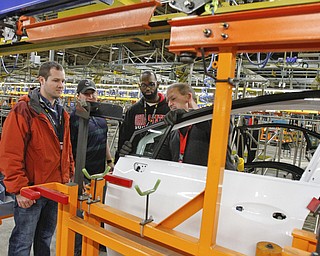       .   ROBERT K. YOSAY  | THE VINDICATOR..Brian Stevens - Patrick Fleischer - Vernon Mills-Steve Burbrink  see how the new line works as trim on a door  is installed.. ..GM Lordstown - as it ramps up to the New Generation Cruise 2016 in February....--30-...