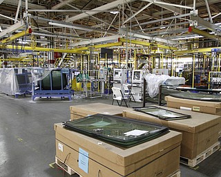       .   ROBERT K. YOSAY  | THE VINDICATOR..Window Glass  will now be put in by  robots..GM Lordstown - as it ramps up to the New Generation Cruise 2016 in February....--30-...