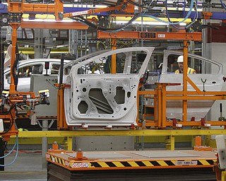       .   ROBERT K. YOSAY  | THE VINDICATOR..Doors and cars -  on the new  trim line..GM Lordstown - as it ramps up to the New Generation Cruise 2016 in February....--30-...