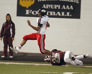ROBERT  K. YOSAY | THE VINDICATOR
Boardman at Harding: Harding's #6 Lynn Bowden eludes the last tackler Boardman's #25 Mario Graziani as he scampered for a first quarter touchdown but it was called back for a penalty and no points scored.