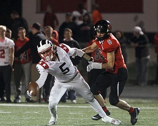 ROBERT  K. YOSAY | THE VINDICATOR.
Niles at Canfield: Niles #5 Rich Limongi tries to recover a pass after Canfield's #6 Michael Rusu helped break up the pass.