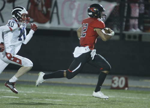 ROBERT  K. YOSAY | THE VINDICATOR
Niles at Canfield: Canfield's #12 Kato Kim takes it to the house during third quarter action for a 78 yard run.