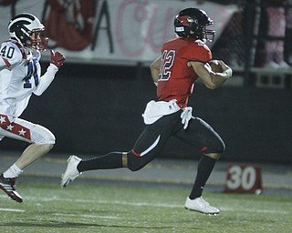 ROBERT  K. YOSAY | THE VINDICATOR
Niles at Canfield: Canfield's #12 Kato Kim takes it to the house during third quarter action for a 78 yard run.