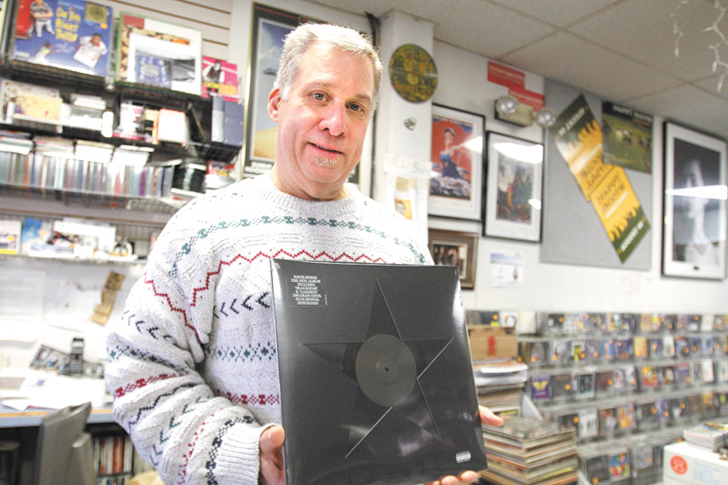 Jeff Burke  with Record Connection and his Bowie collector album 


