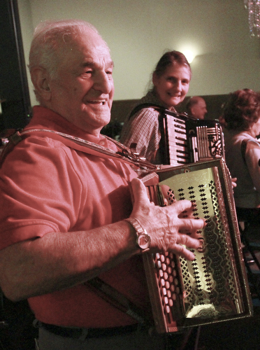 William D Lewis the Vindicator  Pete November of Warren plays the buton box while Laurie James of Warren plays the accordion during a Polka Jam session at Kuzman's  in Girard Friday 1-15-2016. The weekly event gives musicians and fans of polka music and opportunity to enjoy themselves.