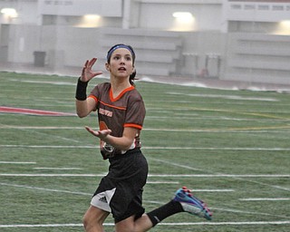 Gabby Lamparty looks to make a catch during practice for the 9-10 year old YYFFA team on Wednesday night at the WATTS.  Dustin Livesay  |   The Vindicator  1/13/16  YSU, WATTS
