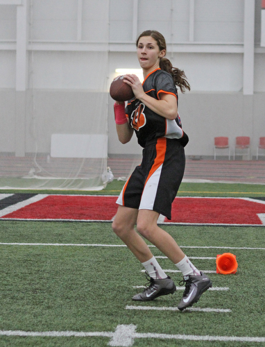 Izzy Lamparty throws the ball during practice for the 10-11 year old YYFFA team on Wednesday night at the WATTS.  Dustin Livesay  |   The Vindicator  1/13/16  YSU, WATTS
