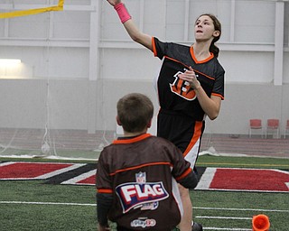 Izzy Lamparty throws the ball during practice for the 10-11 year old YYFFA team on Wednesday night at the WATTS.  Dustin Livesay  |   The Vindicator  1/13/16  YSU, WATTS