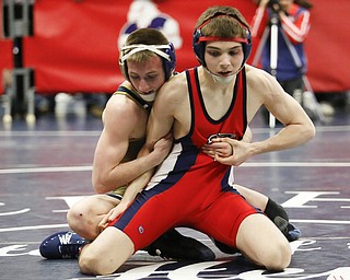 Fitch's Marco Parry, right, wrestles  Brookfield's Gavin Miglets during their 113 pound bout during 2016 Josh Hephner Memorial Tournament at Austintown-Fitch High School, Saturday, Jan. 23, 2016, in Youngstown, Ohio. Alex Slitz for The Vindicator