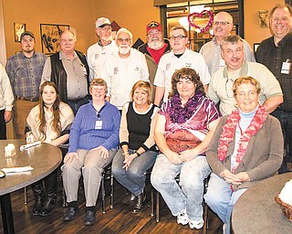 SPECIAL TO THE VINDICATOR- 
Davidson’s Restaurant in Canfield was the setting for the Jan. 10 meeting of Western Reserve Amateur Radio Club that featured the installation of new officers, trustees and appointments. Members and their new responsibilities include, front row from left, social director Amanda Farone, treasurer Rosemary Marko, secretary Jo Wilms, club historian and YouTube manager Terri Mitzel, and newsletter and website manager Jane Avnet; second row, co-directors of Field Day Steve Fabry and Chris Monske, president Bob Mitzel, past president Roy Haren, trustee Darrin Cannon, and badges and Facebook manager John Fabry; and back row, classes, testing and past president Al Avnet, trustee Russ Williams, vice president and publicity manager Joe Wojtowicz, and trustee Harry Harker. The club welcomes licensed amateur radio operators and those interested in learning more about the hobby. For information, call Bob Mitzel at 575-910-1456.