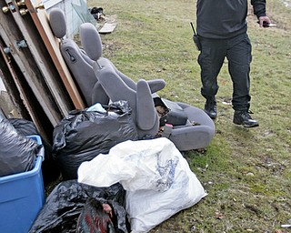      ROBERT K. YOSAY  | THE VINDICATOR.. dead chickens...  on myron Street in Youngstown..-30-