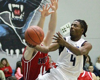William D Lewis The Vindicator East"s M. Marrow(4) jumps past Fitch's Anthony Pangio(11) and Derek Gunter(22) during 1-29-16 game at East.