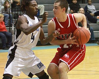 William D Lewis The Vindicator Fitch's Dom Difrancesco(23) keeps the ball from East"s M. Morrow(4) during 1-29-16 game at East.