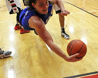 Poland's Nick Buccieri (15) dives to save the ball from going out of bounds during Friday nights matchup against Canfield at Canfield High School.  Dustin Livesay  |  The Vindicator  1/29/16  Canfield High School.