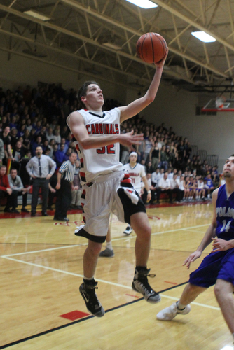 Canfield's Julian Vitto (32) takes an easy layup during Friday nights matchup against Poland High School at Canfield High School.  Dustin Livesay  |  The Vindicator  1/29/16  Canfield High School.
