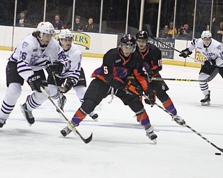 Youngstown Phantoms defensemen Vas Kolias (5) tries to keep the puck away from Tri-City's Alex Limoges (26) during the first period of Friday nigths matchup at the Covelli Center in downtown Youngstown.  Dustin Livesay  |  The Vindicator  2/5/16  Covelli Center.