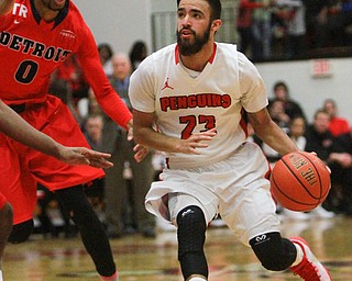 William d lewis The Vindicator YSU's Francisco santiago(23) drives around Detroits Chris Jenkins(0) during 2-6-15 action.