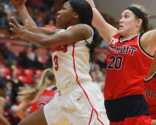 William d lewis The Vindicator YSU's Indiya Benjamin(3)shoots past Detroits Nicole Urbanick(20) during 2-6-15 action.