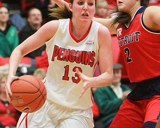 William d lewis The Vindicator YSU's Kelsea Newman(13) drives around Detroits Haleigh Ristovski(2) during 2-6-15 action.
