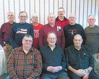 SPECIAL TO THE VINDICATOR | Joseph Lane and associates of Lane Family Funeral Home sponsored a catered breakfast at A La Carte Catering in Canfield to recognize the VFW Meander Post 9571 Honor Guard’s dedication to performing military funeral services for deceased veterans. Lane presented the VFW Post with a donation to enable the Honor Guard to continue to provide their services for veterans and their families, and post commander Jim Tornincasa accepted the gift. Members of the Honor Guard include, seated from left, Tornincasa, John Craig, and Keith Rosier, and standing, Rich Hopkins, Ken Calhoun, Don Brown, Ray Schafer, Tom Check, Don Schrock and Fred Schrock.