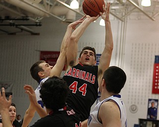 Canfield's Mason Mangapora (44) takes a jump shot in traffic during the second quarter of Friday nights matchup at Poland High School.  Dustin Livesay  |  The Vindicator  2/12/16  Poland.
