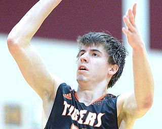 Jeff Lange | The Vindicator  FRI, FEB 12, 2016 - Springfield's Graham Mincher attempts a two-point shot during the Tigers' game at South Range High School on Friday.