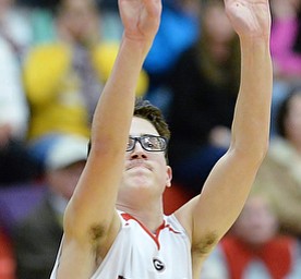 Jeff Lange | The Vindicator  TUE, FEB 16, 2016 - Girard's Tyler Such attempts a three-point shot in the first quarter of the Indians' basketball game against Springfield at Girard High School on Tuesday.