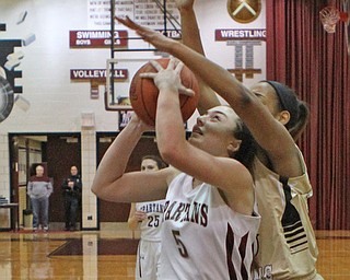 Boardman's Jenna Vivo (5) tries to take a shot but if closely defended by Warren Harding's Shymara Dykes (10) during the first quarter of Thursday nights matchup at Boardman High School.  Dustin Livesay  |  The Vindicator  2/18/16  Boardman.