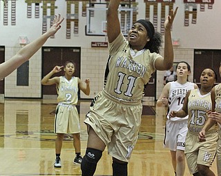 Warren Harding's Toni Donaldson (11) puts up an open jump shot during the second quarter of Thursday nights matchup against Boardman High School at Boardman High School.  Dustin Livesay  |  The Vindicator  2/18/16  Boardman.