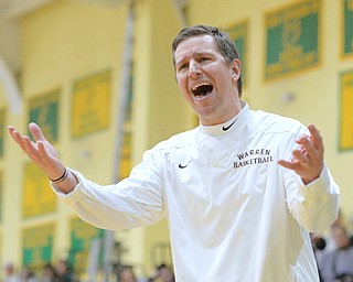 Jeff Lange | The Vindicator  THU, FEB 18, 2016 - Harding head coach Andy Vlajkovich reacts to a call made by an official during the Raiders' game at Ursuline on Thursday.