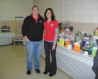 SPECIAL TO THE VINDICATOR | Boardman Lions Club will host its 18th annual Night at the Races fundraiser at 6 p.m. March 5 at the Operating Engineers Hall, 291 McClurg Road, Youngstown. a $10 entrance fee includes an unlimited buffet sponsored by several area restaurants, beer and a variety of non-alcoholic beverages. There will be a basket raffle and a silent auction with items donated by restaurants, specialty shops and events. The races will begin at 7. Proceeds from the event will be used to support Coats for Kids, eyeglass purchases and eye exams for Boardman children and adults in need, maintenance of flower gardens surround the Boardman welcome signs, two scholarships for Boardman high school seniors and the purchase of trees for fourth grade students. To learn more about the Boardman Lions Club or the event, visit boardmanlions.com. Cochairpersons for the event, Chuck Rudge and Joyce Mistovich, are shown standing in front of the many donated gift baskets.