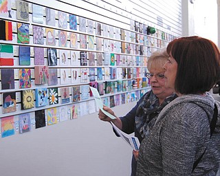 SPECIAL TO THE VINDICATOR | The Davis Family YMCA, 5 McClurg Road, Boardman, opened its third annual Five Squared art show on Feb. 7 and sales of the 5-by-5-inch art pieces raised $2,200 for the YMCA's art outreach program that provides art classes for local children. The show is on display through March 7 and artworks are available to purchase. The exhibit is free and open to the community. Call 330-480-5656 or email Suzanne Gray at sgray@youngstownymca.com for information.