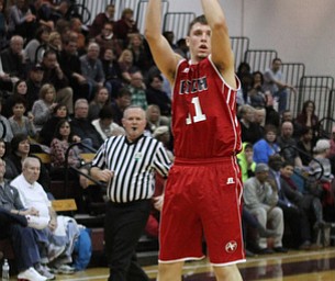 Austintown Fitch's Anthony Pangio (11) attempts an open 3-pointer during the second quarter of Friday nights matchup against Boardman at Boardman High School.  Dustin Livesay  |  The Vindicator  2/19/16  Boardman High School.