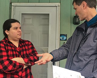      ROBERT K. YOSAY  | THE VINDICATOR..Ed Runyan explains the water lead  results to Lee Ann Mazza on South Street...--30-...