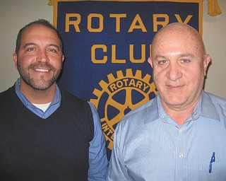 SPECIAL TO THE VINDICATOR | Ed Kalaher, owner of Window Depot, was speaker at the January meeting of the Austintown Rotary Club. He discussed the importance of people, performance and price in the Canfield company that he owns with business partner Richard Begalla. Their triple pane windows have earned an Energy Star superior rating and are made locally in Lordstown. Kalaher, left, is shown with Rotary president Mal Culp following his speech. During the meeting, the Rotary discussed plans for its annual reverse raffle on March 5 at the Maronite Center that will include an open bar, dinner catered by Blue Wolf, entertainment, cash prizes and a basket auction for $150 per couple. For tickets, contact any Rotary member or call Mark Cole at 330-953-1307.